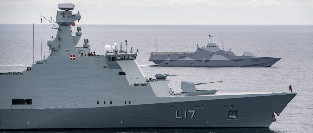 200615-N-RG482-0204 BALTIC SEA (June 15, 2020) The Royal Danish Navy Absalon-class support ship HDMS Esbern Snare (L17), front, and the Swedish Royal Navy Visby-class corvette HMS Karlstad (K35) sail in formation in the Baltic Sea during exercise Baltic Operations (BALTOPS) 2020, June 15, 2020. BALTOPS is the premier annual maritime-focused exercise in the Baltic Region, marking the 49th year of one of the largest exercises in Northern Europe enhancing flexibility and interoperability among allied and partner nations. (U.S. Navy photo by Mass Communication Specialist 1st Class Kyle Steckler)

