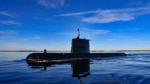 A submarine in the water.