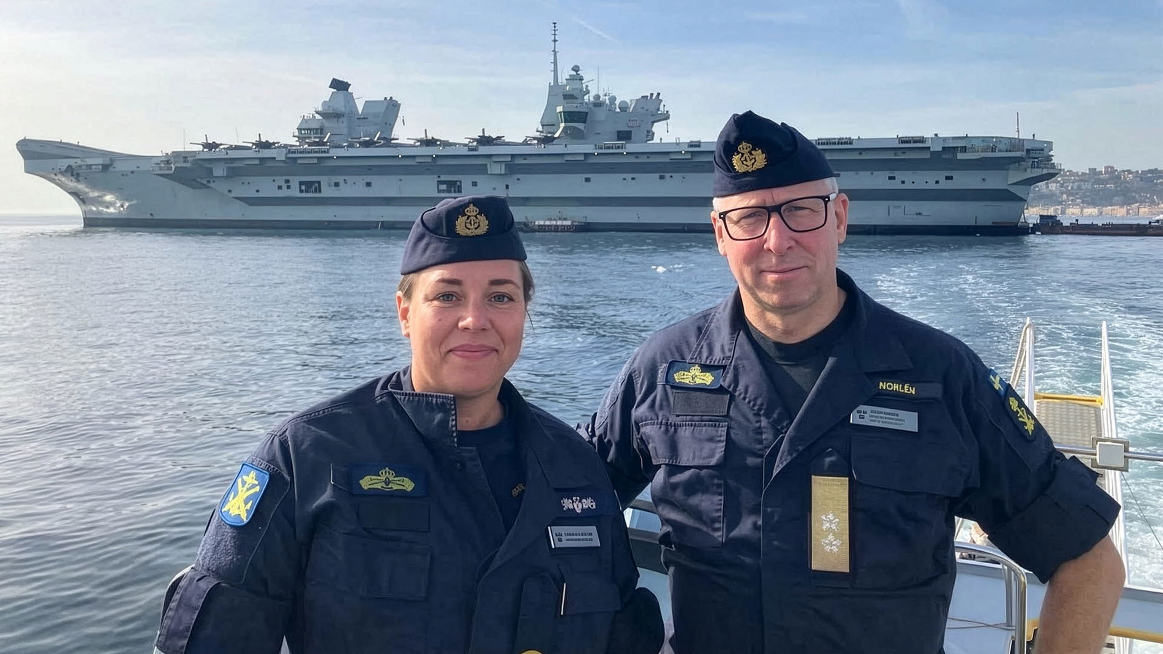 Two officers and a ship